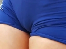 Young gay guy shows off his tight ass in shorts