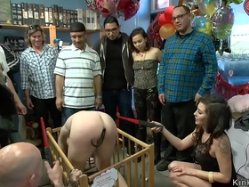 Group of sexy slaves humiliated and toyed in public shop