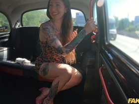 Inked beauty seduces driver in POV taxi ride