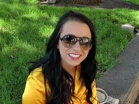 A brunette woman directs a man to a location and exposes her bare body