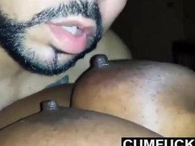 A fair-skinned black woman enjoys large-breasted women with prominent nipples at CumFuckMe.pw